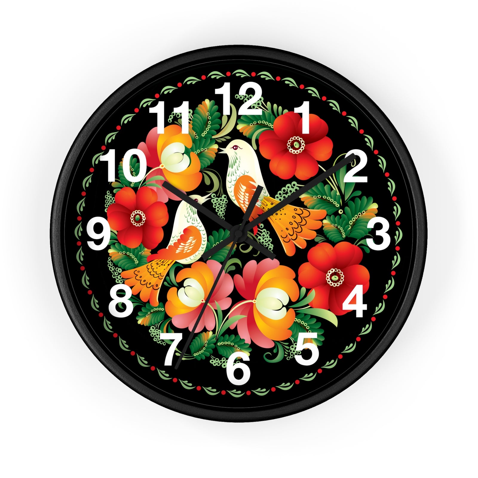The Folk Art Love Birds Wall Clock features a round black frame and face, adorned with colorful folk art flowers and two white birds at the center. White numbers and black hands add charm to this whimsical wall decor for any room.