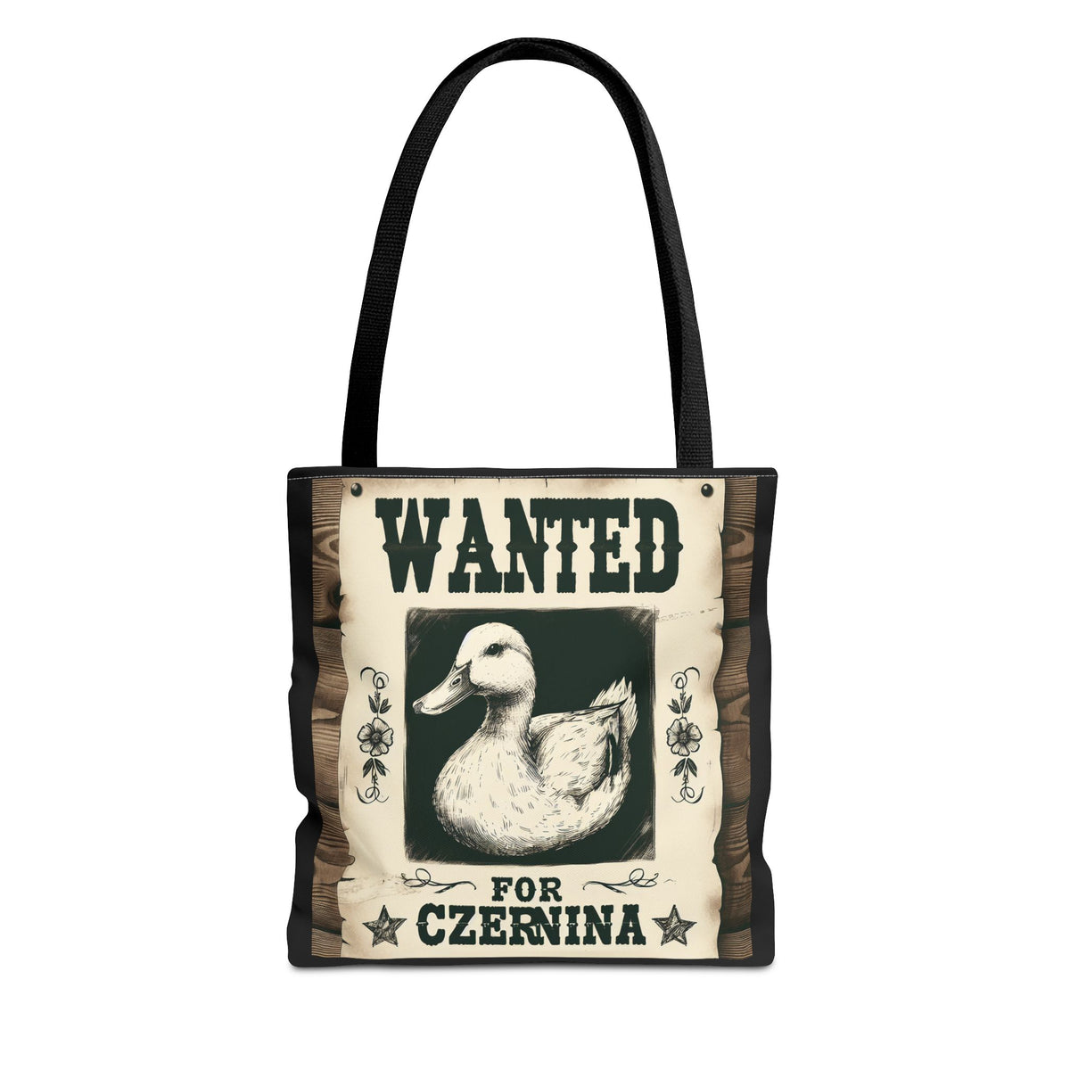 The Funny Wanted Duck For Czernina Tote Bag in black showcases a cartoon duck on a wanted poster with &quot;WANTED FOR CZERNINA,&quot; playfully nodding to the classic Polish duck blood soup. Durable and perfect for adding humor to your everyday style.