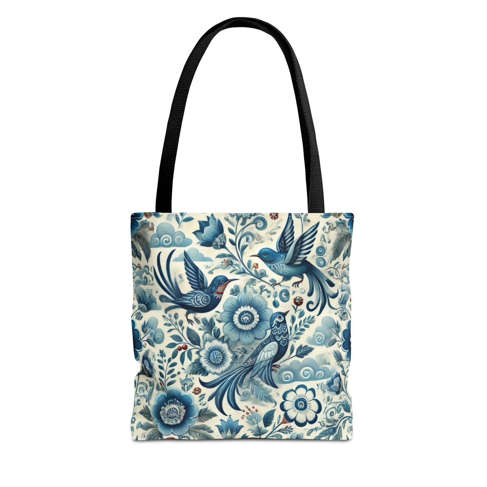 The Polish Folk Art Floral & Birds Vibrant Blue Tote Bag has black handles and features a lively all-over print of blue and white florals, birds, and intricate foliage on a light background.