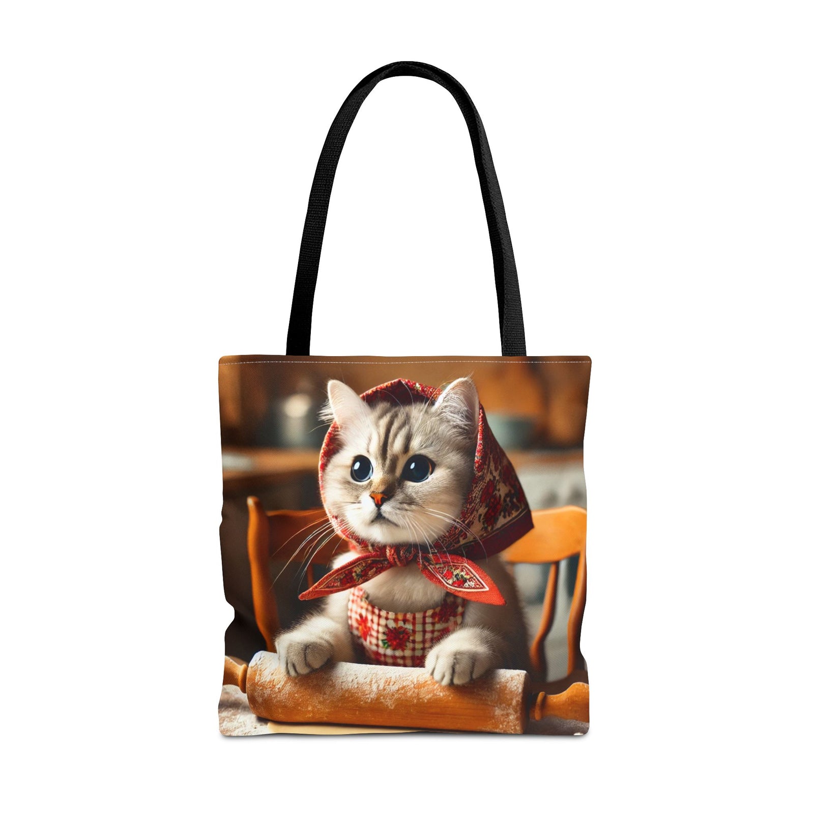 The Adorable Polish Cat With Rolling Pin Tote Bag in black features a cute cat in a red headscarf with flour and a rolling pin in a cozy kitchen—an eco-friendly gift that's perfect for cat lovers.