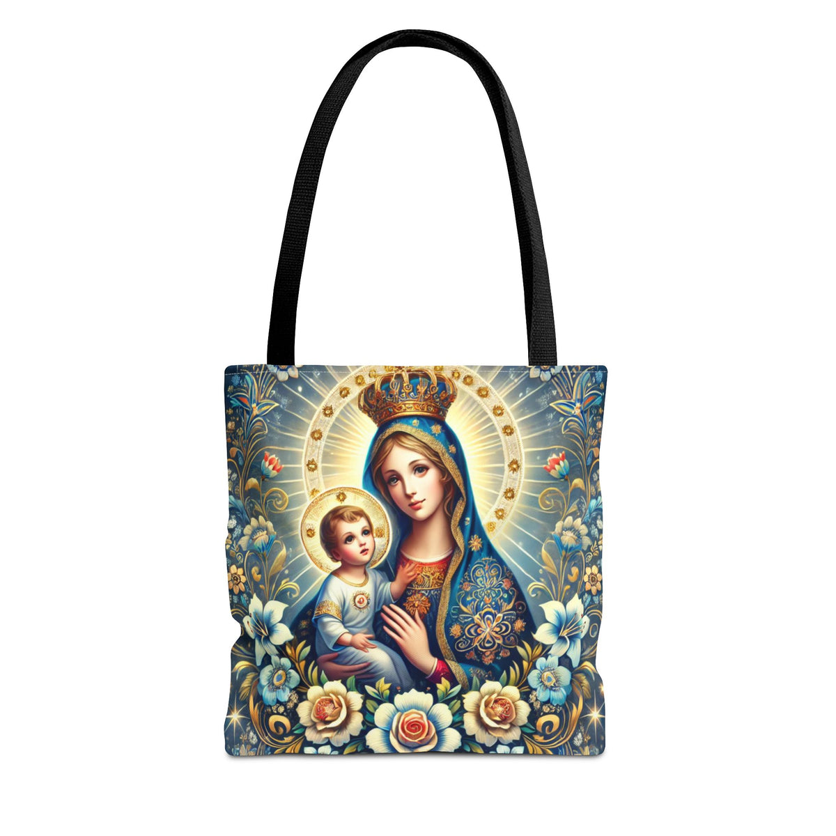 The Virgin Mary Baby Jesus Floral Folk Art Tote Bag in black features an ornate all-over print of a crowned Virgin Mary with baby Jesus, both with halos, surrounded by blue, gold, and white floral folk art patterns.