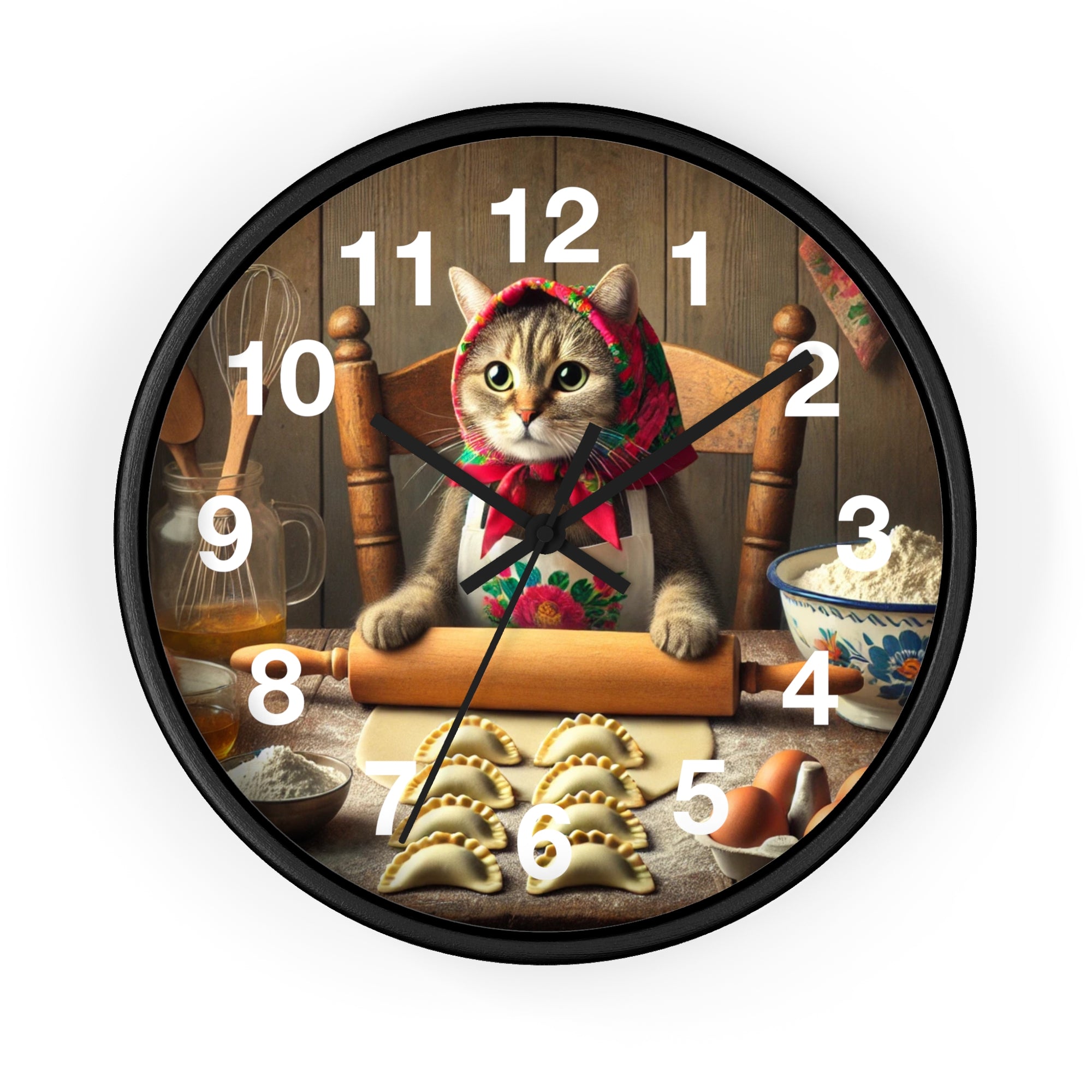 The Babushka Cat Making Pierogi Wall Clock features a cat in a headscarf rolling dough among pierogi, flour, and eggs—an ideal gift for cat lovers or a playful decor accent for any kitchen.