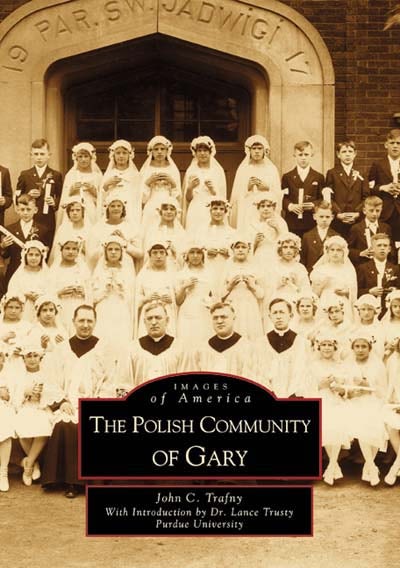 On the cover of &quot;The Polish Community of Gary,&quot; a vintage photo shows Polish immigrants—children dressed in white and adults in black robes—gathered before a brick building, capturing the heritage of this Midwest steel city.