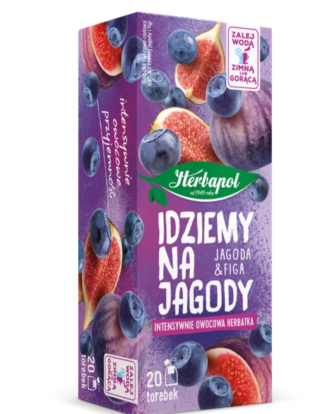 A vibrant purple box of Herbapol “Idziemy na Jagody” (Berry &amp; Fig / Jagoda &amp; Figa) tea displays blueberries and figs, Polish text, and icons for hot or cold brewing. The package contains 20 herbal fruit tea bags.