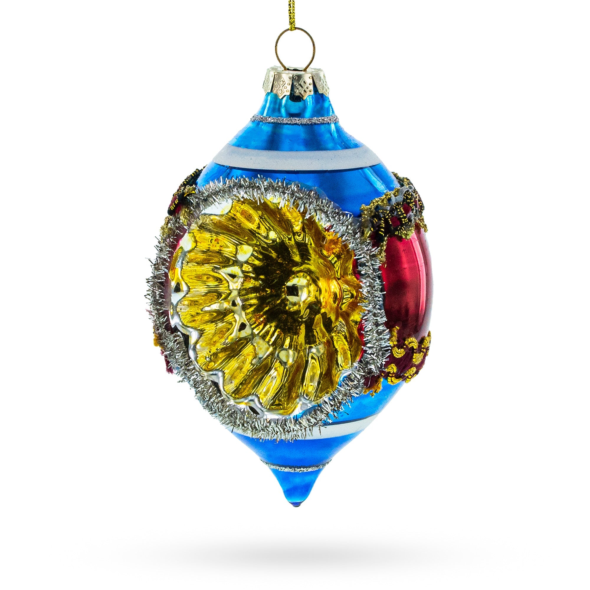 The Retro Reflection Blue Retro-Inspired Glass Christmas Ornament features blue, silver, red, and gold sections with glitter and tinsel accents, hanging against a white background.