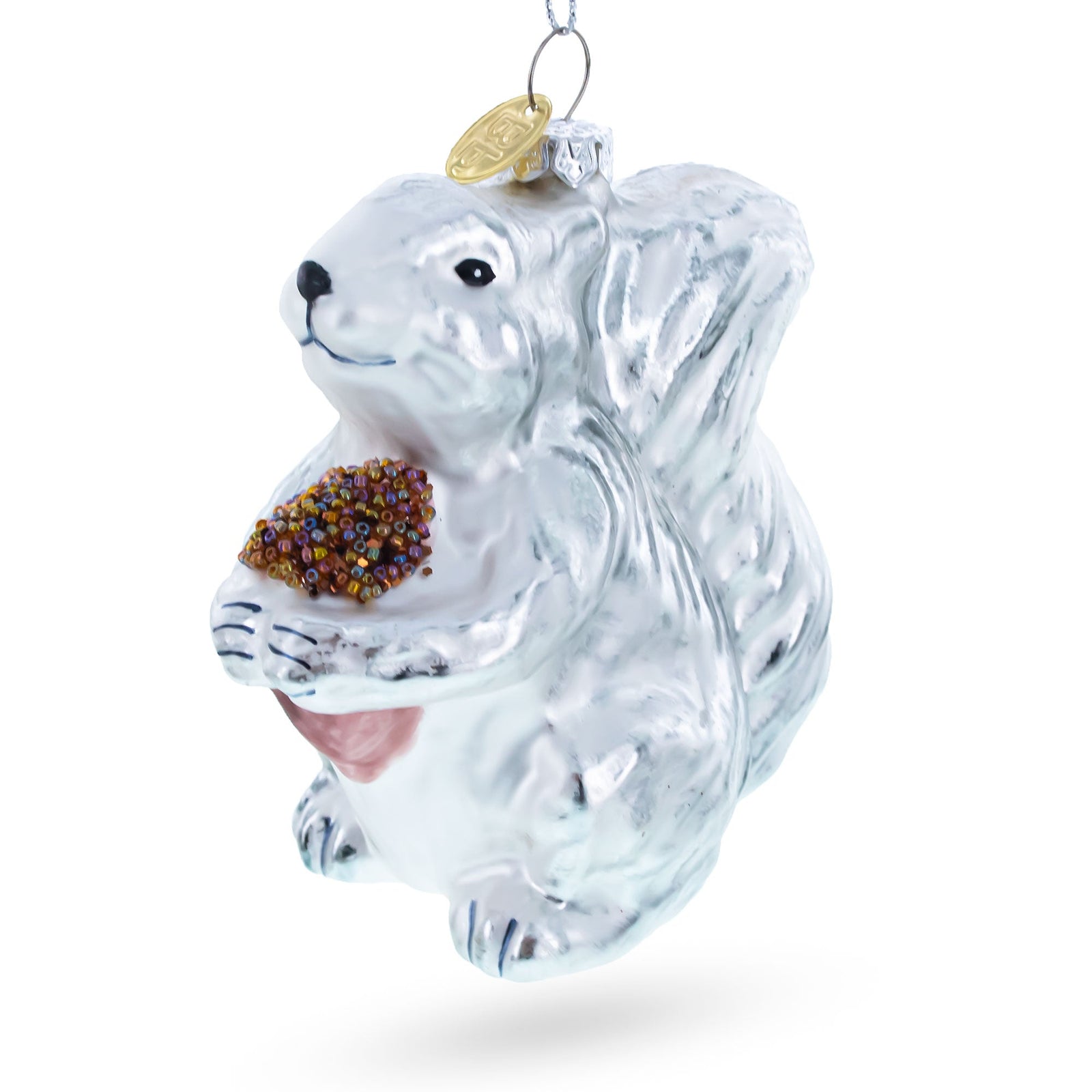 The Silver Squirrel Retro Glass Christmas Ornament features a shiny silver squirrel holding colorful beads and a gold tag for hanging—an adorable touch for your holiday décor.