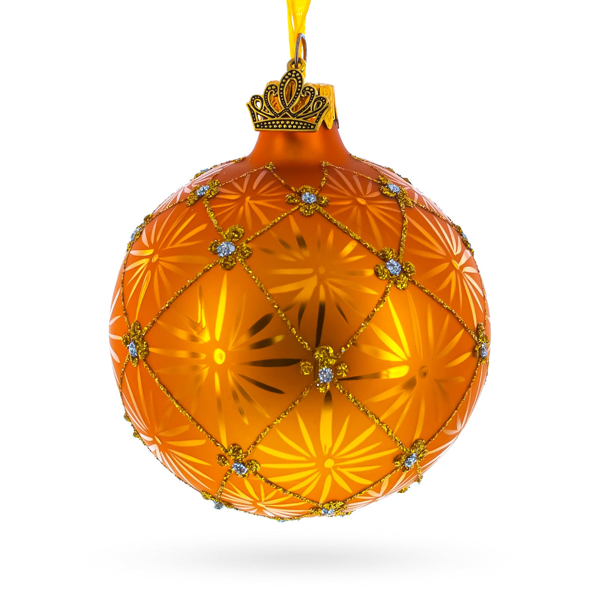 The 1897 Coronation Royal Gold Glass Christmas Ornament (3.25&quot;) features a crown-shaped top, embossed geometric pattern, glittery lines, and gem-like accents, hanging from a yellow ribbon—a luxurious holiday decoration.