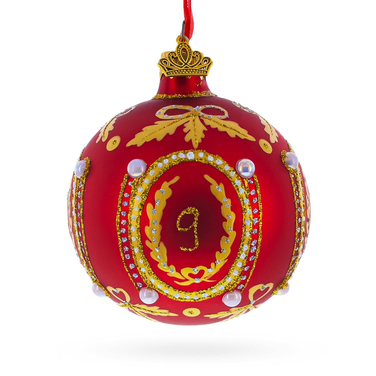 The 1893 Caucasus Royal Red Glass Ball Christmas Ornament (3.25") features gold patterns, white pearls, a crown-shaped top, and the number 9 in gold at its center with ornate details and rhinestones.