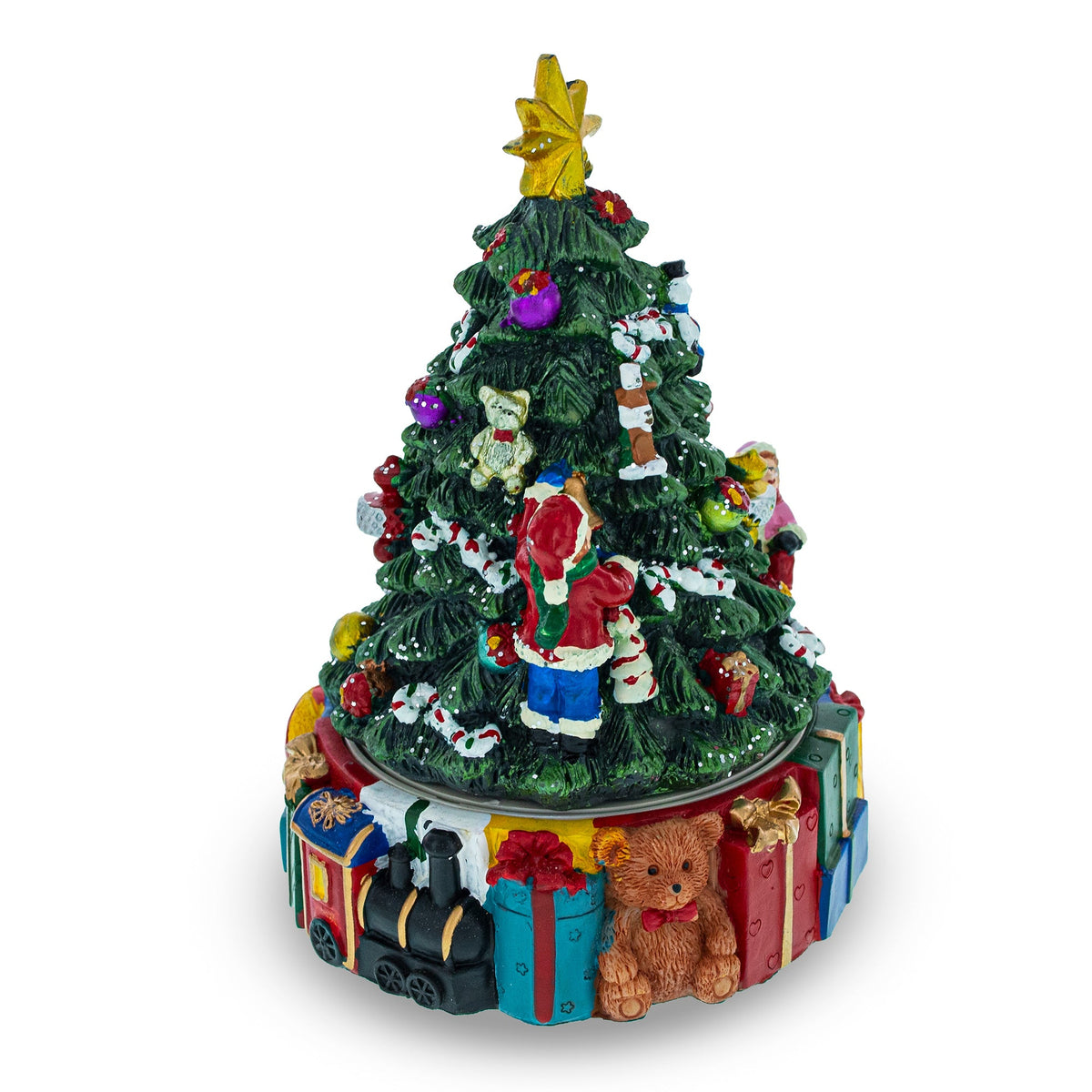 The Spinning Base Musical Figurine features children decorating a Christmas tree, with colorful presents, a teddy bear, and a toy train at the base for festive holiday charm.