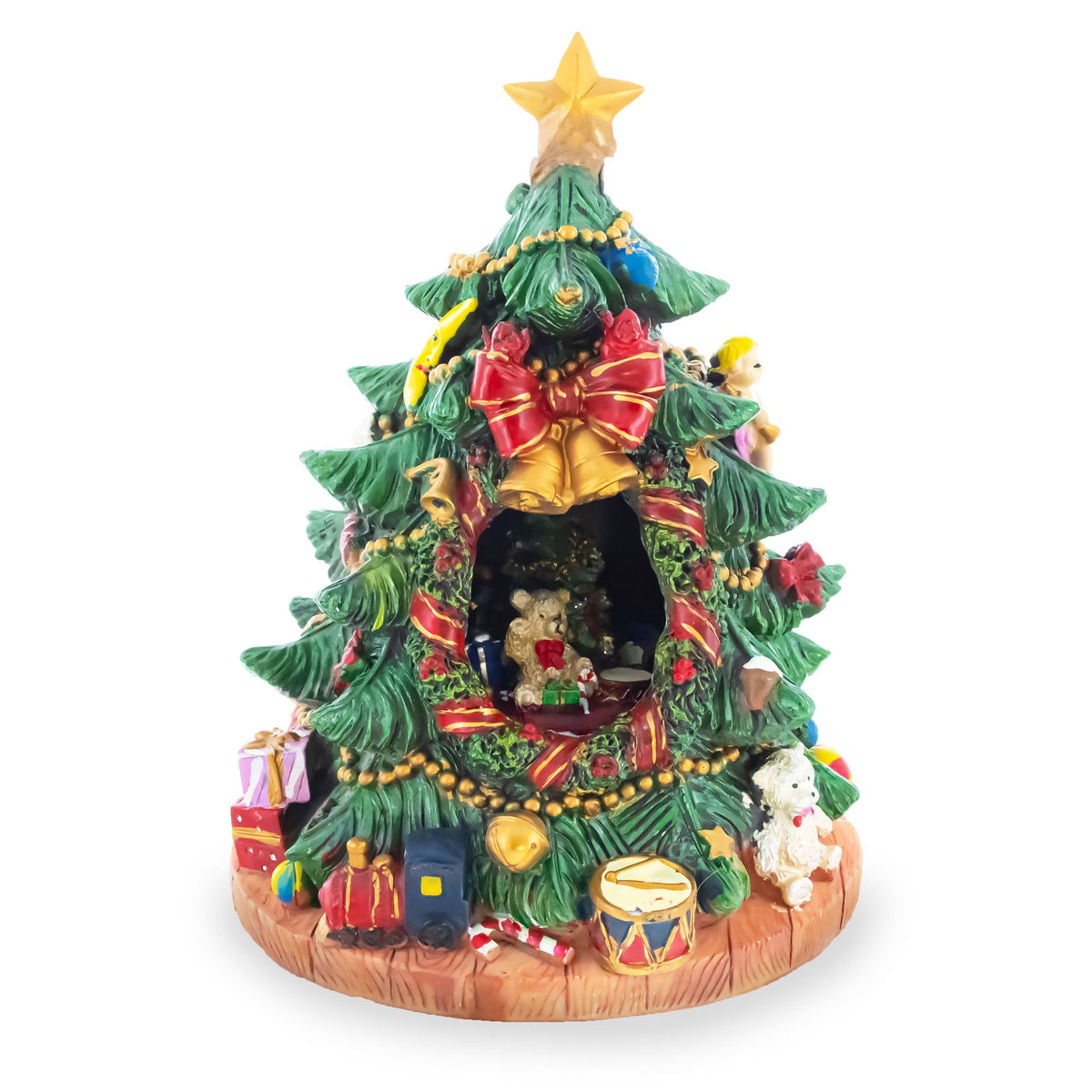 The Tabletop Tree Spinning Musical Christmas Figurine features ornaments, bows, presents, a central nativity scene in a hollow, and assorted holiday toys at the base for a festive touch.